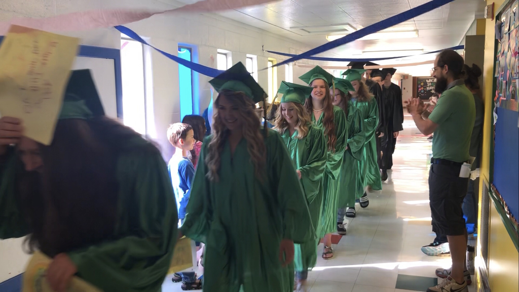 Class of 2019 walking through the Elementary. 