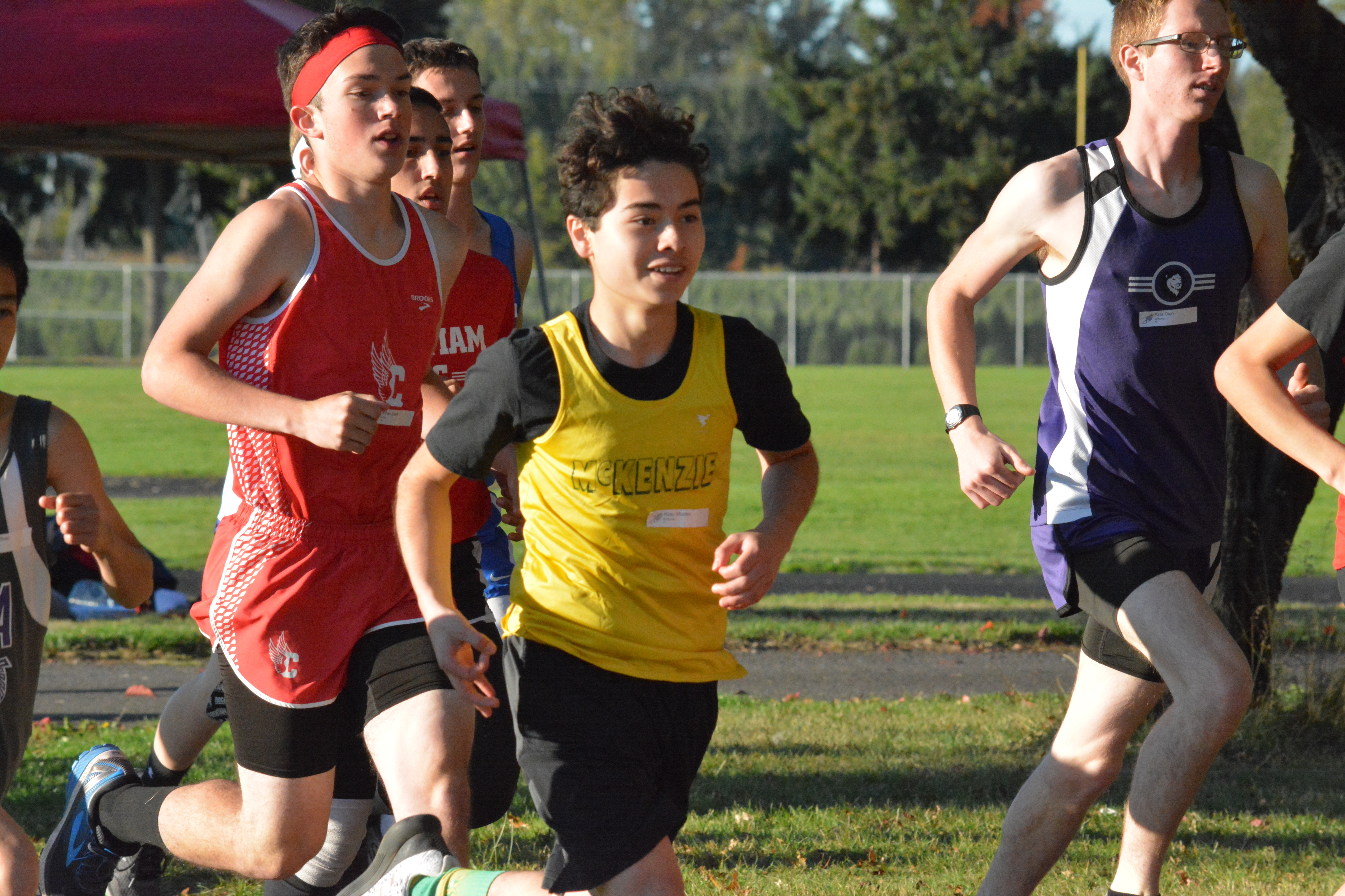 Student running in a cross country race.